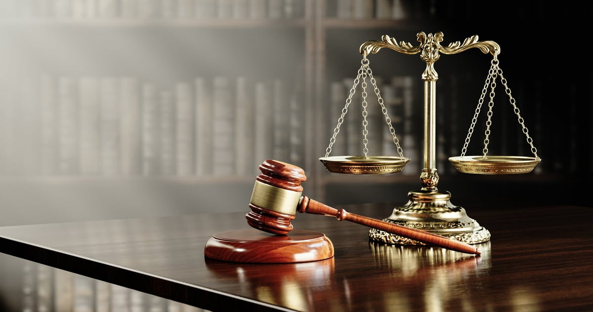 Legal concept: Scales of justice and the judge's gavel hammer as a symbol of law and order.
